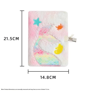 Detail view of plush mermaid notebook showing size measurements and secure metal lock