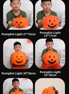 Size comparison of four light-up pumpkin lanterns with Jack-O'-Lantern faces