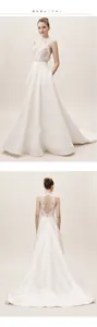 Detail of high neck lace bodice and satin wedding dress back with decorative buttons