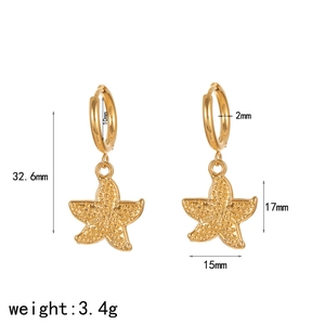 Macro view of 18k gold plated starfish earrings with dimensions and weight info