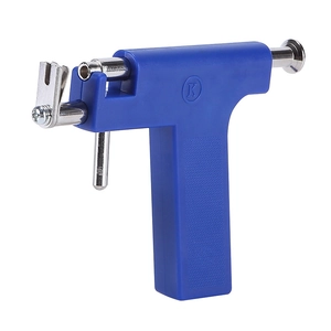 Macro shot of blue professional ear piercing gun tool with durable metal components