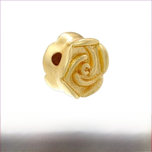 Detailed close-up of 18K gold-plated brass rose flower loose bead for DIY jewelry making
