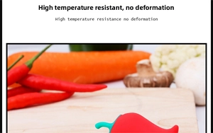 Silicone red chili-shaped pot lid lifter for spill prevention on wooden board