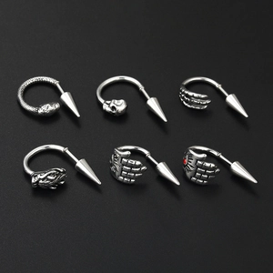 Gothic punk silver horseshoe rings set with skull eagle claw and snake head charms