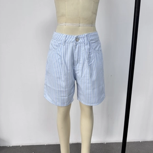 Detailed view of blue and white vertical striped high waisted denim shorts on a mannequin