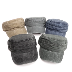 Detailed close-up showing five colors of washed cotton cadet caps with reinforced stitching