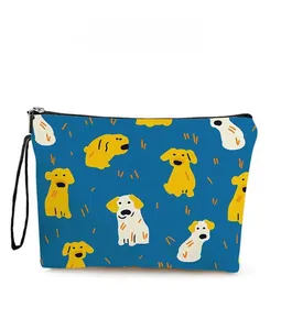 Detailed close-up of blue cartoon puppy cosmetic bag with black zipper and wrist strap