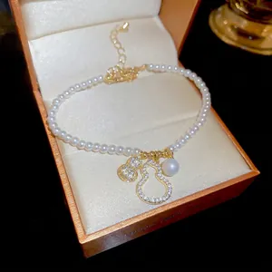 Elegant French style pearl bracelet with golden zircon gourd charms in a gift box