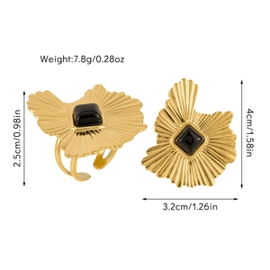 Detailed view showing dimensions and weight of gold rings with black square stones