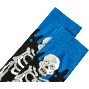 Detailed view of rib-knit cuffs and white skull graphics on blue-black cotton socks