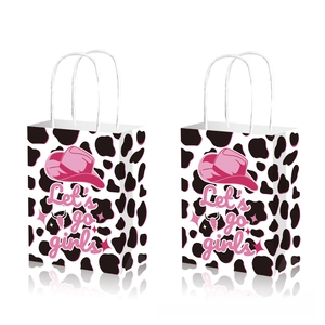 Pink cow print paper gift bags with cowgirl hat design and rope handles