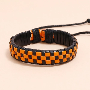 Minimalist woven leather bracelet in black and orange with adjustable cord knot closure