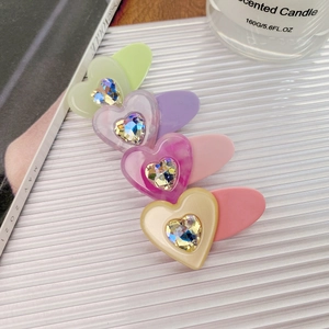 Set of 4 colorful macaron heart hair clips with sparkling crystals for girls
