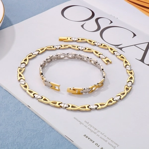 Two-tone gold and silver infinity link jewelry set with necklace and bracelet