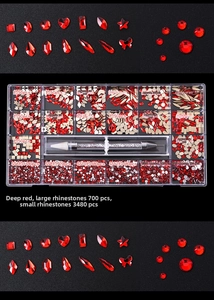 Detailed set of red nail art rhinestones with multi-size flatback crystals and dotting pen