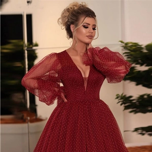 Elegant deep V-neck evening gown in burgundy with polka dot mesh lantern sleeves