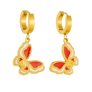 Detail of gold hoop earrings with red and white enamel butterfly charms on white background