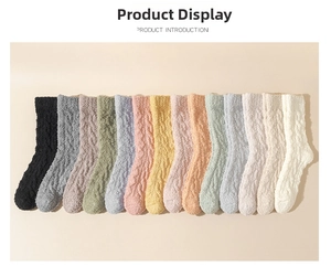 Flat lay of colorful coral fleece socks in 12 vibrant colors with cable knit texture