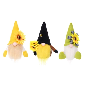 Three handmade sunflower gnome plush dolls with bees and plaid bows on white background