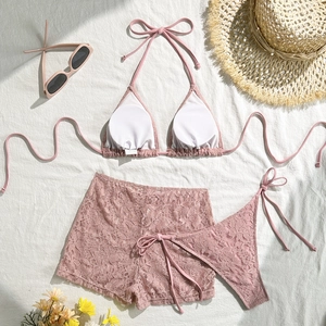 Three-piece lace bikini set with halter top and side-tie shorts in dusty rose