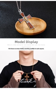 Classic stainless steel cross pendant with dark wood inlay on a twisted rope chain