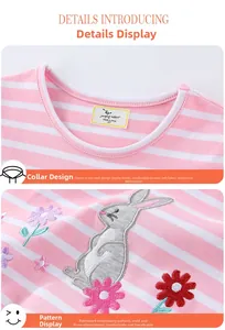 Détail d'un t-shirt rayé rose en coton avec broderie de lapin fleuri pour tout-petits