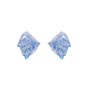 Irregular blue resin stud earrings with glitter effect on a clean white background