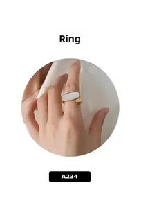 Detail of 18K gold-plated chain link ring with a white oval shell inlay for women