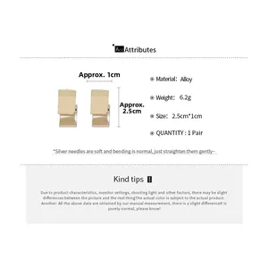 Detailed view of bicolor square stud earrings in gold and silver finish with dimensions