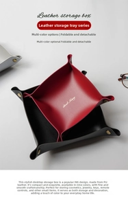 Close-up of foldable PU leather desktop trays with metallic snaps and gold lettering