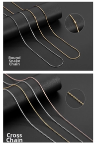 Detailed macro view of S925 sterling silver snake and cross chains in gold and silver