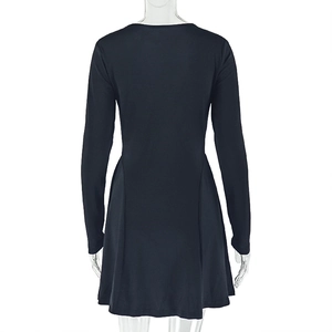 Back view of a long-sleeved black A-line dress showing slim fit cut and pleated skirt