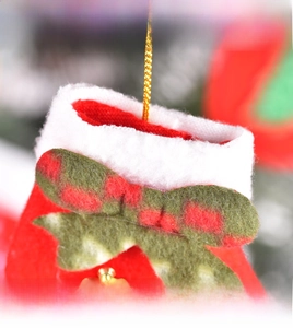 Detailed macro view of the festive red Christmas stocking hanger with white faux fur trim