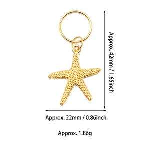 Macro view of gold starfish pendant showing dimensions 42mm height and 22mm width