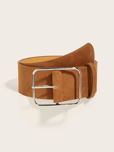 Detail of a brown suede wide waist belt featuring a polished silver square metal buckle