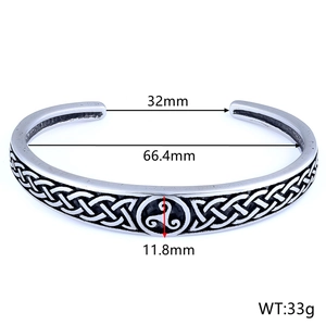 Detailed view of Celtic knot cuff bracelet with triskelion totem and size measurements