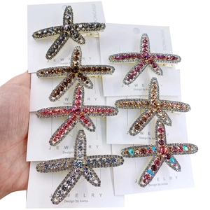 Set of minimalist alloy starfish hair clips with multi-color rhinestones and duckbill base