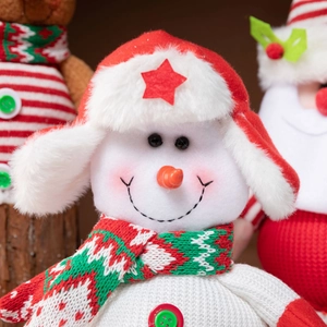 Handcrafted Christmas snowman plush doll with knitted hat and festive scarf decoration