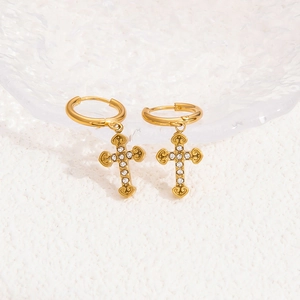 Golden stainless steel hoop earrings with crystal encrusted cross charm for women