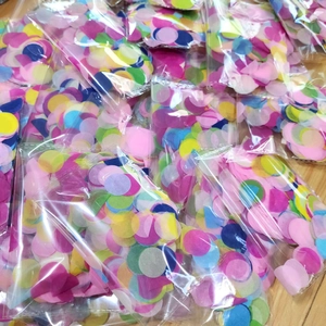 Close-up of colorful round tissue paper confetti bags for party and balloon filling