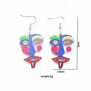 Detailed view of colorful abstract face earrings showing 6cm height and 2.8cm width specs