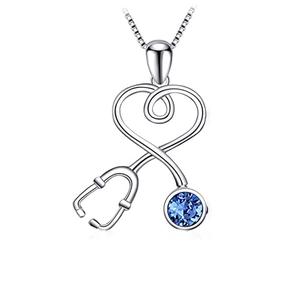 Minimalist silver stethoscope heart pendant necklace with blue gemstone on white background