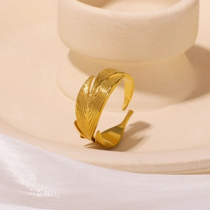 Polished 18K gold plated stainless steel feather ring with adjustable open design