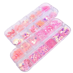 Close-up of dual organizers with pink mermaid sequins, beads, and glitter for nail art