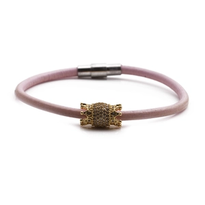 Pink leather bracelet with golden crown charm and magnetic steel clasp for women