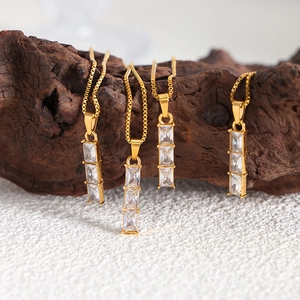Elegant 18k gold plated titanium necklace with triple tiered rectangular zircon pendants