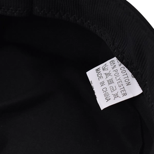 Detail of internal washing label showing 35% cotton and 65% polyester fabric blend
