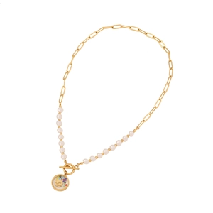 Gold stainless steel pearl necklace with circular bird and gemstone pendant