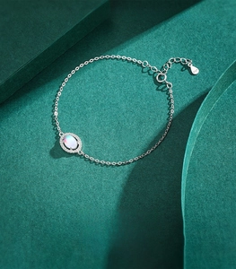 Detailed view of S925 sterling silver bracelet showing moonstone inlay and adjustment chain