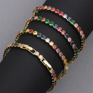 Close-up of 18K gold plated tennis bracelets with colorful round-cut cubic zirconia
